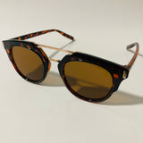 mens and womens brown and gold round sunglasses with crossbar