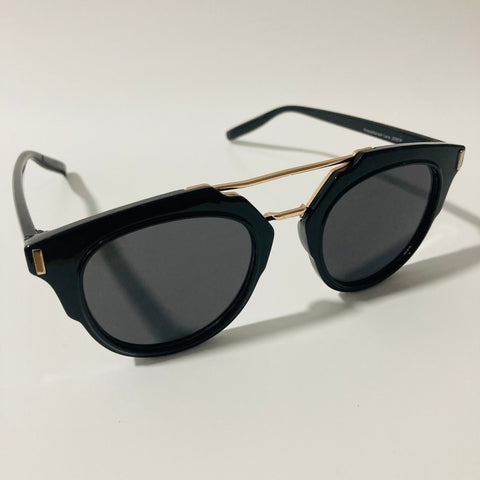 mens and womens black and gold round sunglasses with crossbar