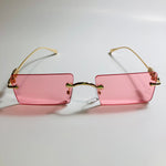 gold rimless womens sunglasses with pink lenses and flower accent