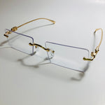 gold rimless womens sunglasses with clear lenses and flower accent