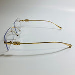 gold rimless womens sunglasses with clear lenses and flower accent