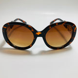 womens brown round oversize sunglasses with rhinestones