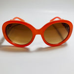 womens brown and orange round oversize sunglasses with rhinestones