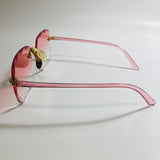 womens rimless gold square oversize sunglasses with pink lenses