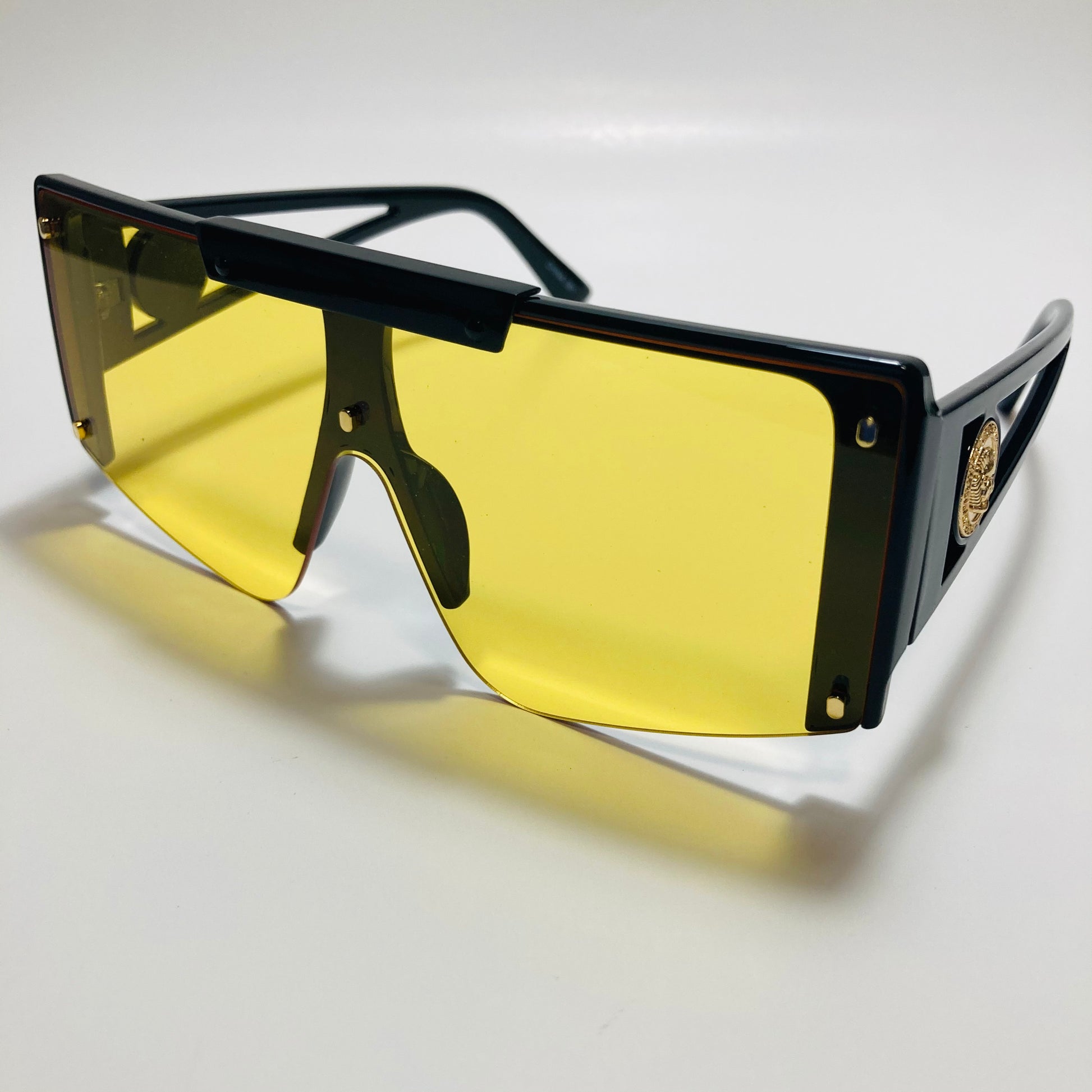 womens black and yellow oversize shield sunglasses
