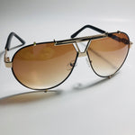 mens and womens brown and gold aviator sunglasses