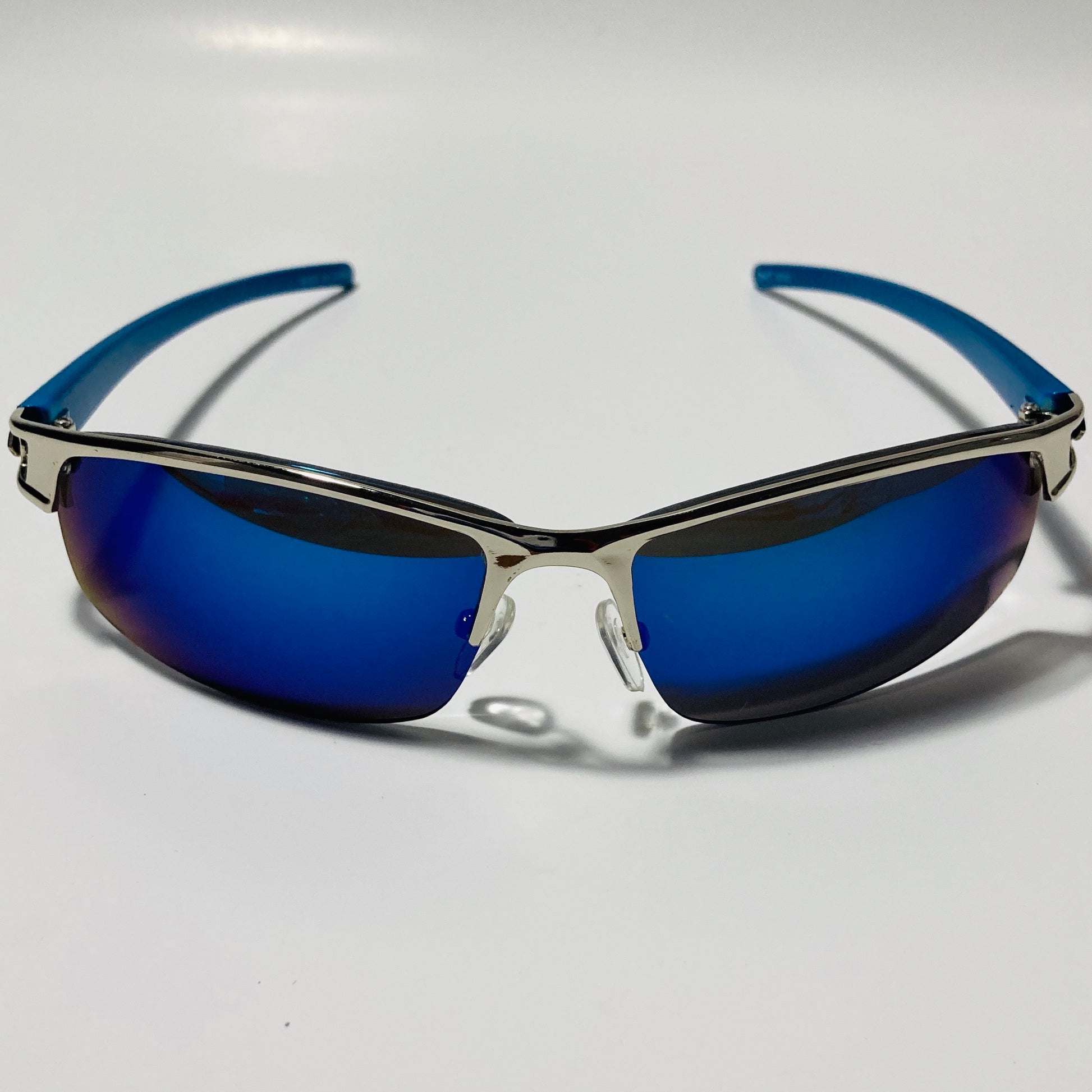 womens and mens silver wrap around sunglasses with mirrored blue lenses