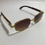 mens and womens brown and gold oval sunglasses