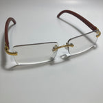 mens and womens clear and gold rimless square sunglasses